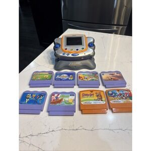 V Tech VSmile Pocket Learning System Console With 8 Games & Charging Deck